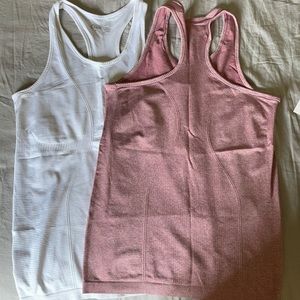 Worn once ZYIA copper charged tanks.